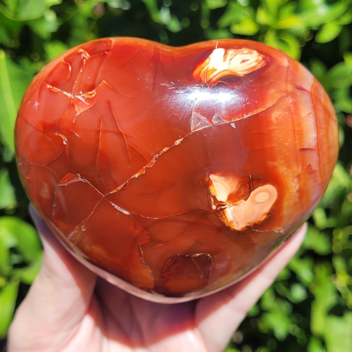 Large orange and red Carnelian heart crystal