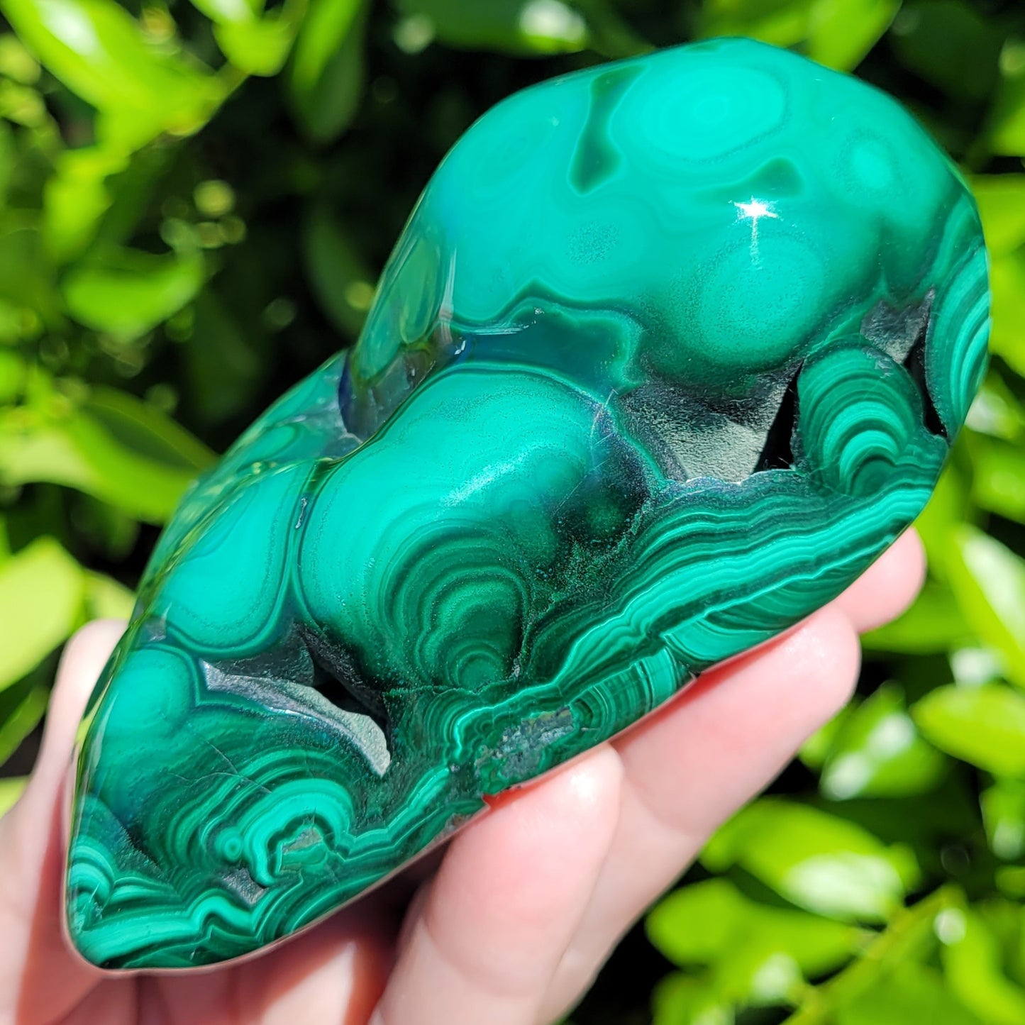 Malachite polished crystal specimen