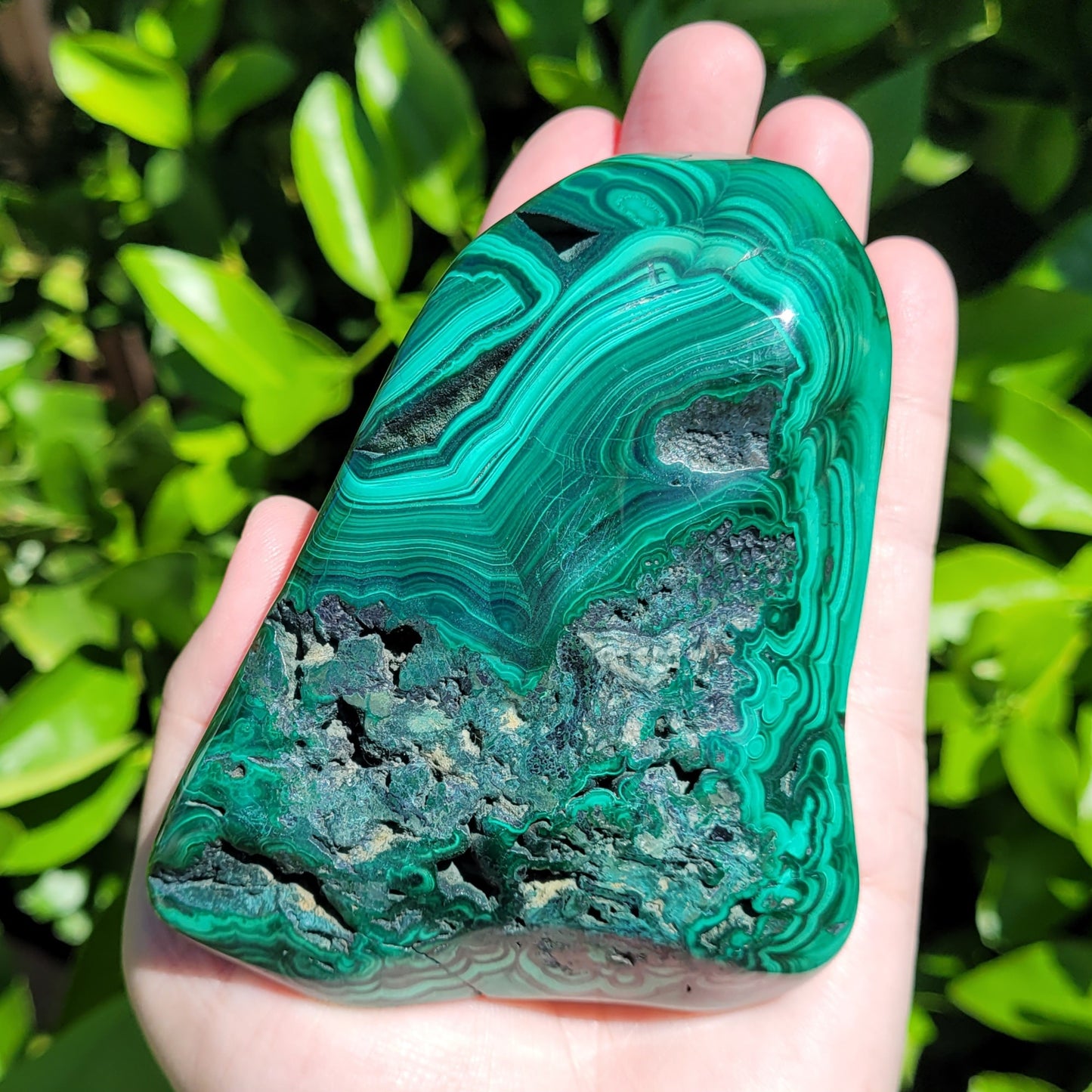 Malachite polished crystal specimen