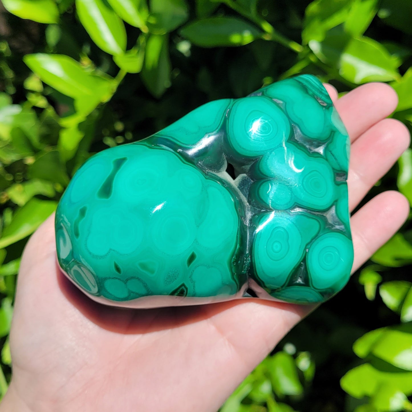 Malachite polished crystal specimen