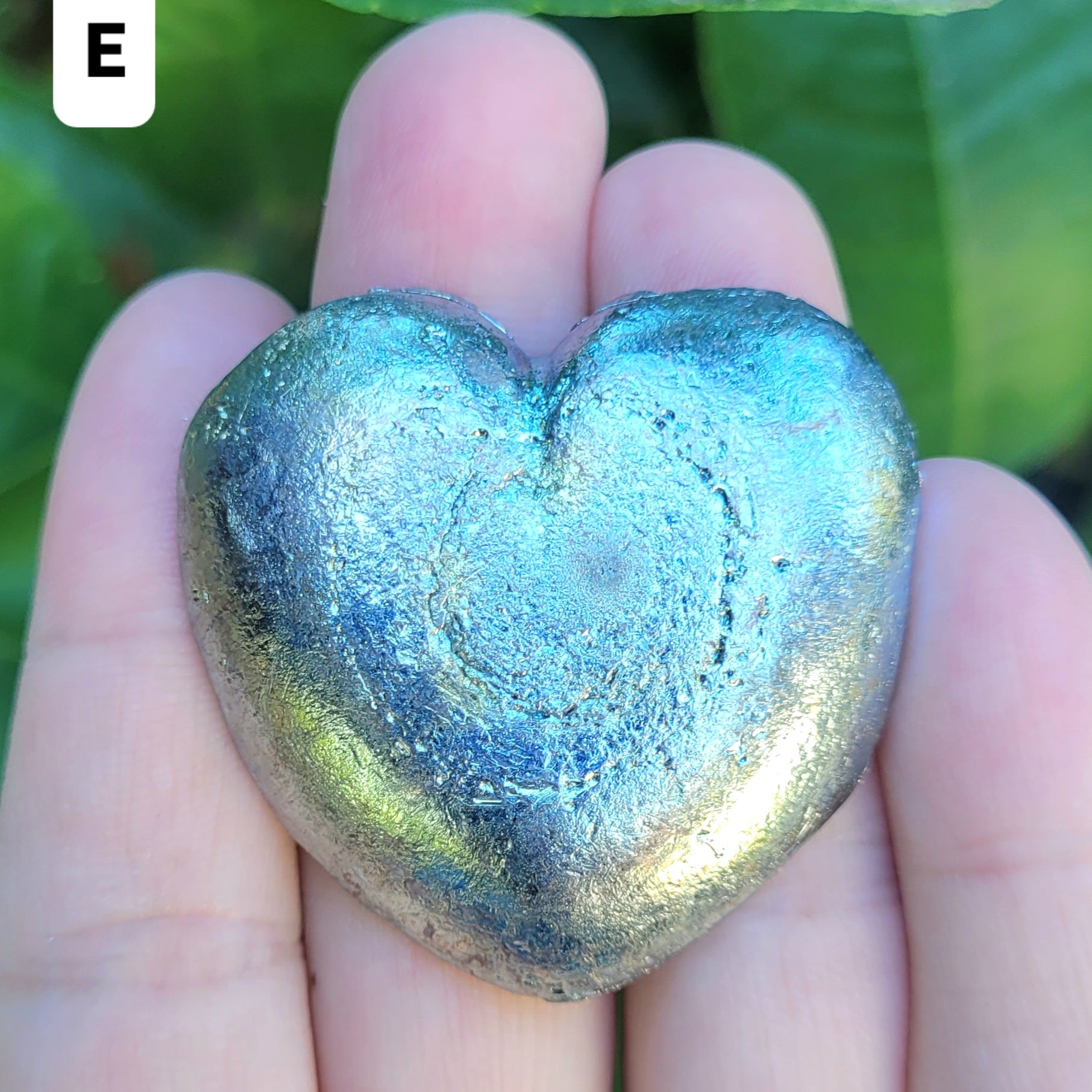 Bismuth heart with crystals