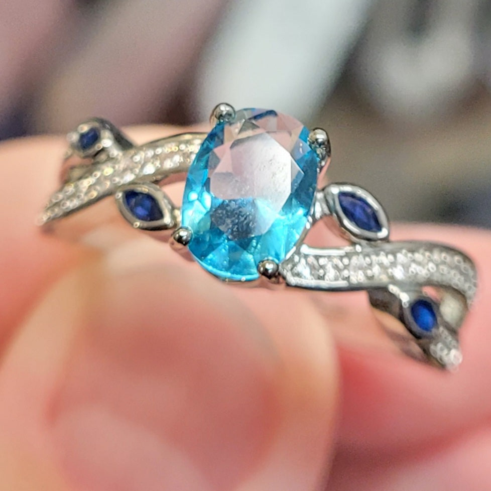 Bright Blue Oval Sapphire Leaf Style Sterling Silver Plated Ladies Ring- Sizes 6, 7, 8, 9