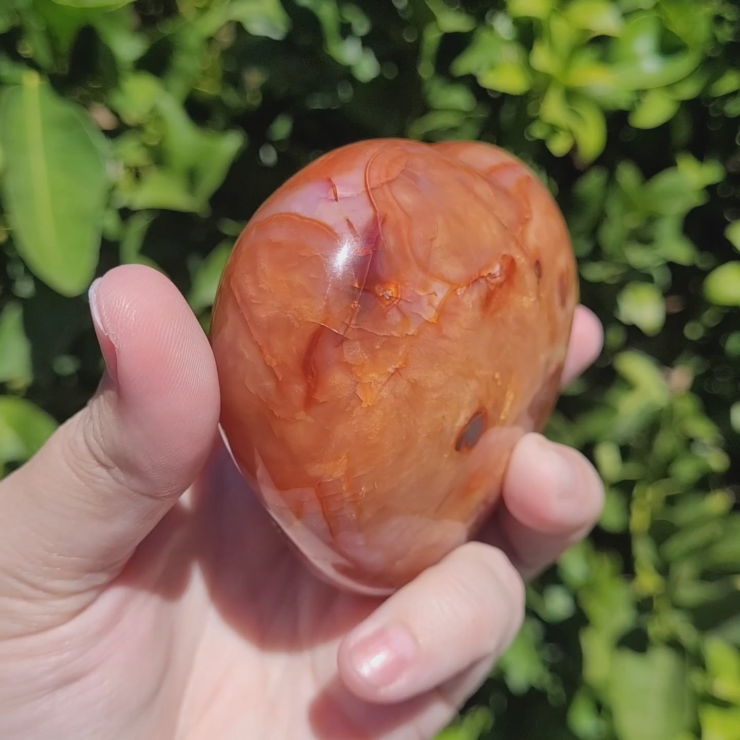 Large orange and red Carnelian heart crystal